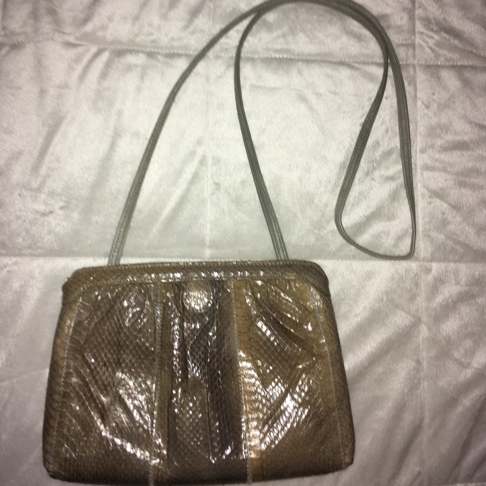 Can be used as a clutch or crossbody